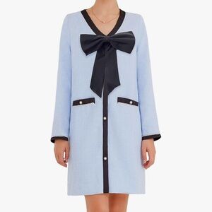 Elegant Light Blue Dress with Black Bow